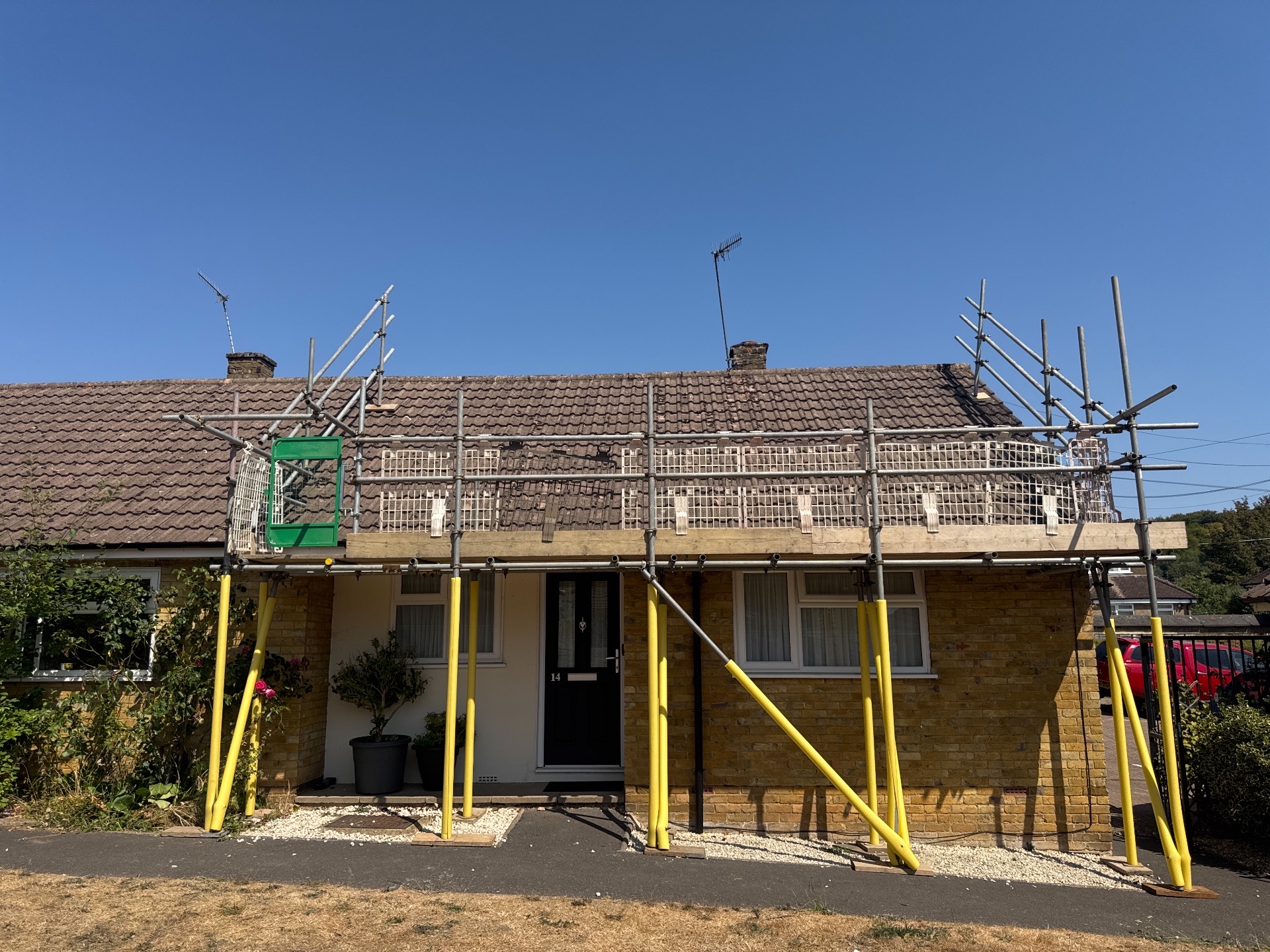Domestic scaffolding erected by ATC Scaffolding around a house for roofing and exterior works