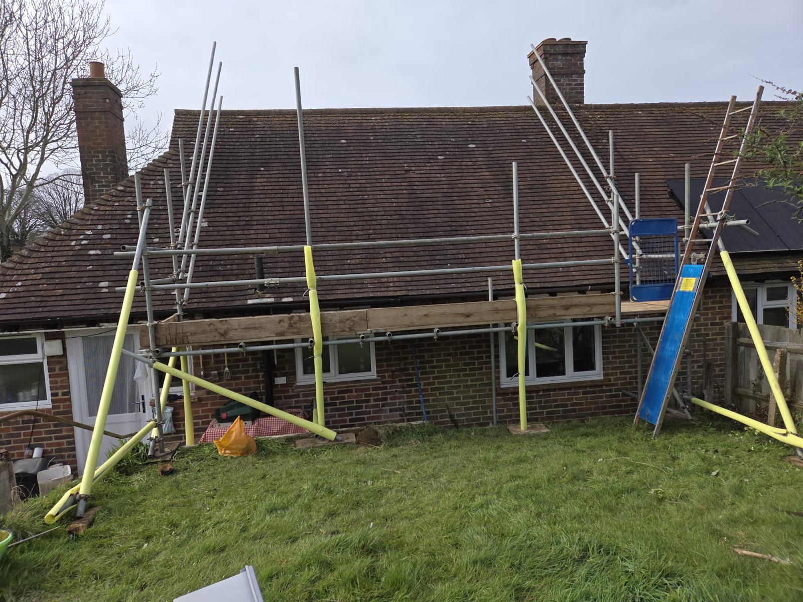 Domestic scaffolding erected by ATC Scaffolding around a house for roofing and exterior works