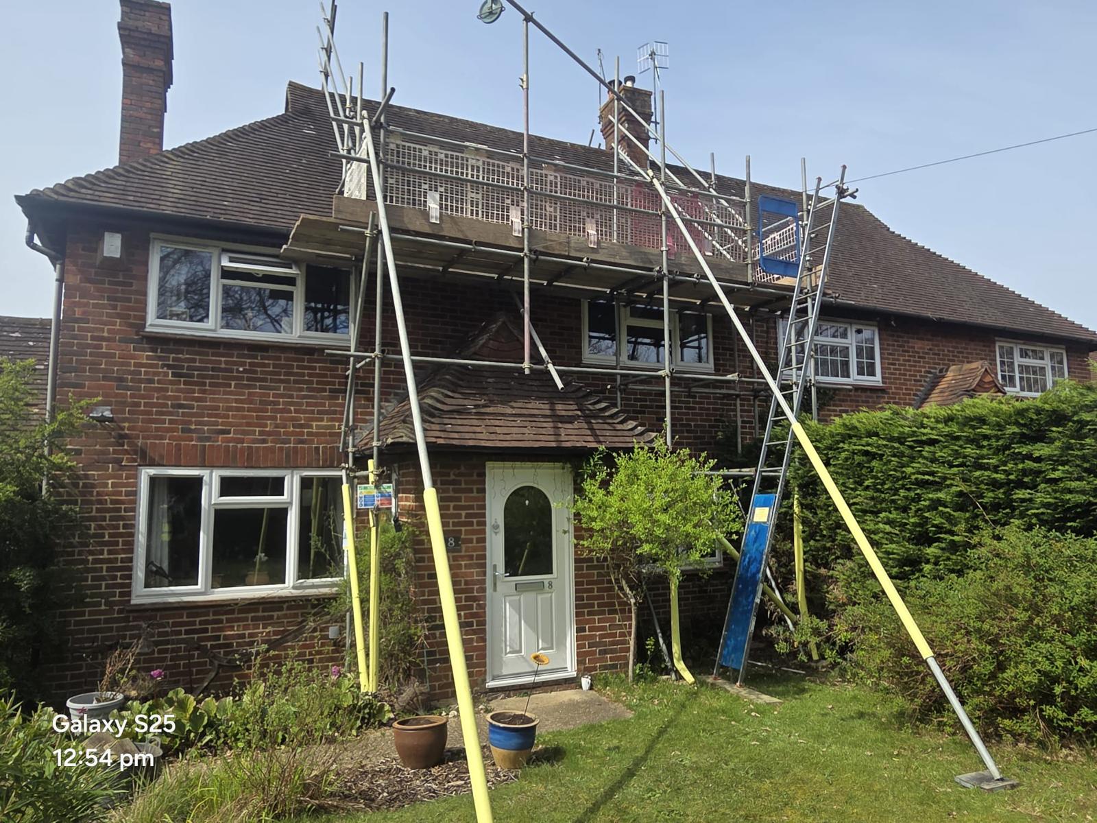 Domestic scaffolding erected by ATC Scaffolding around a house for roofing and exterior works