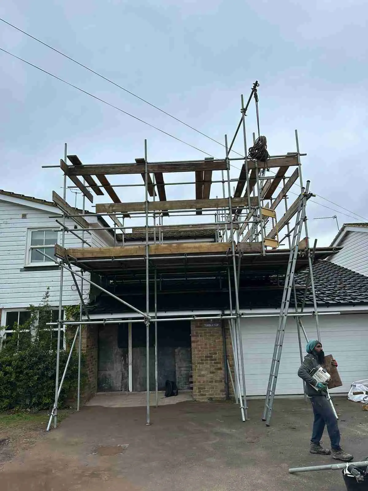 Domestic scaffolding erected by ATC Scaffolding around a house for roofing and exterior works