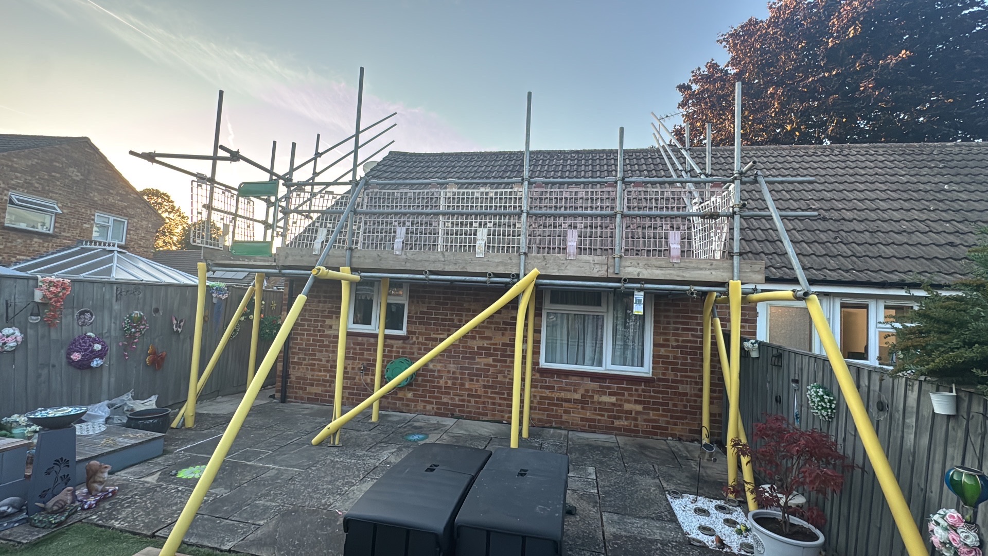Domestic scaffolding erected by ATC Scaffolding around a house for roofing and exterior works