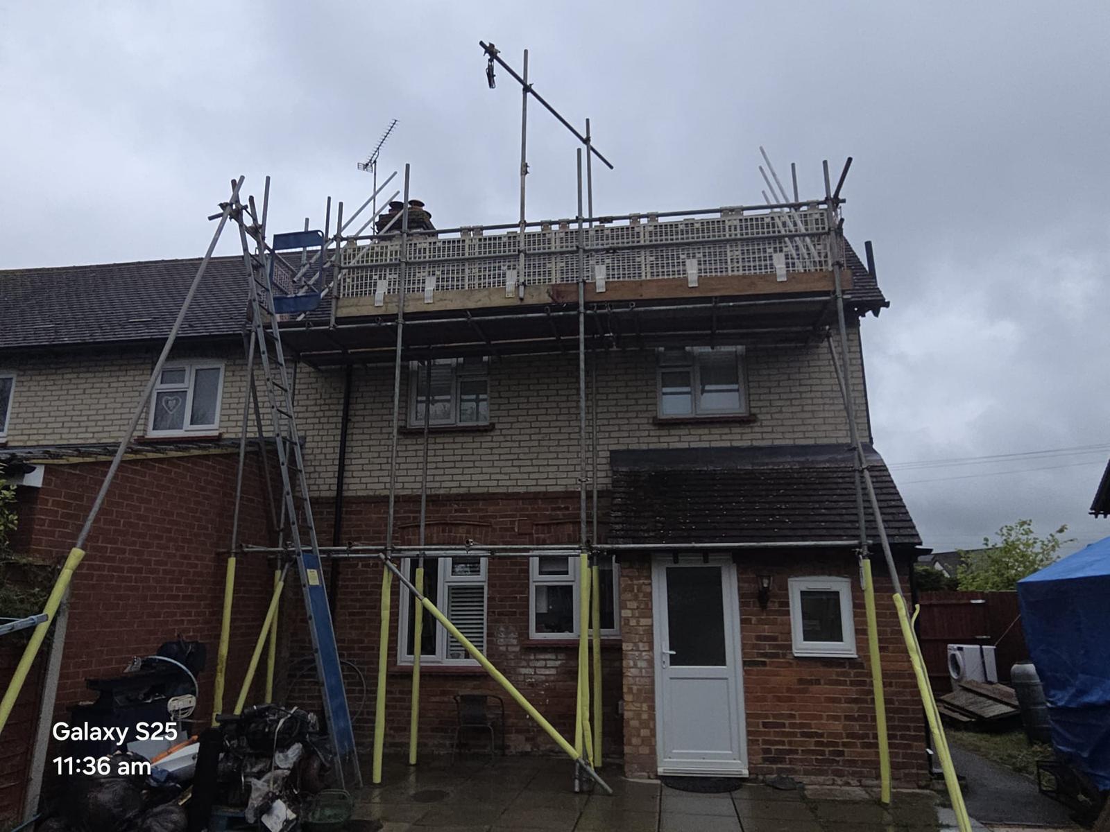 Domestic scaffolding erected by ATC Scaffolding around a house for roofing and exterior works