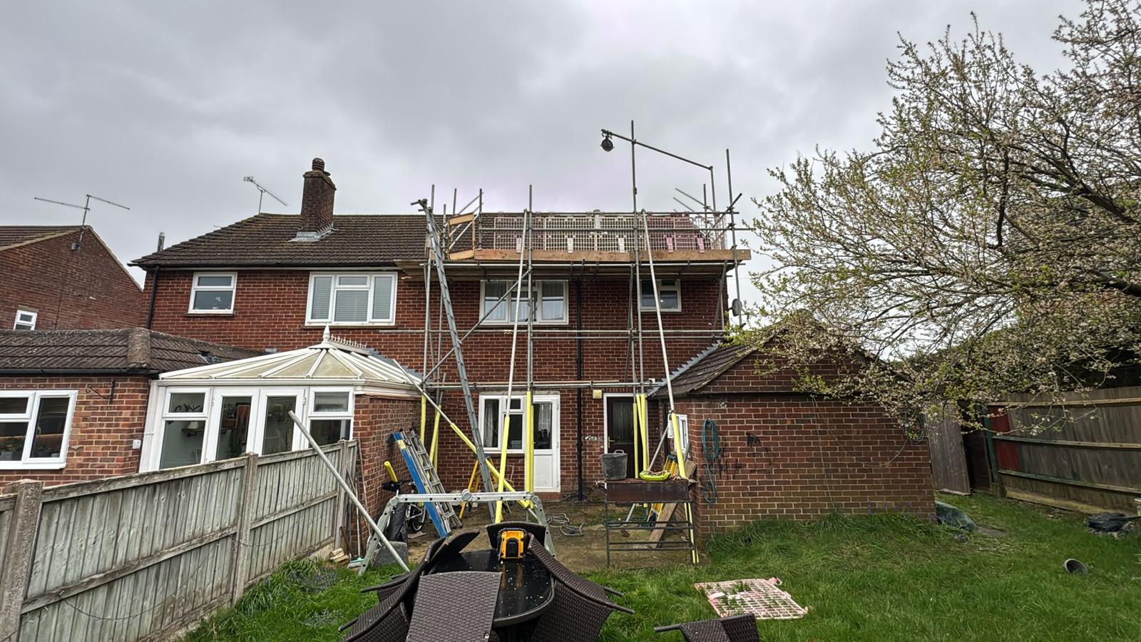Domestic scaffolding erected by ATC Scaffolding around a house for roofing and exterior works