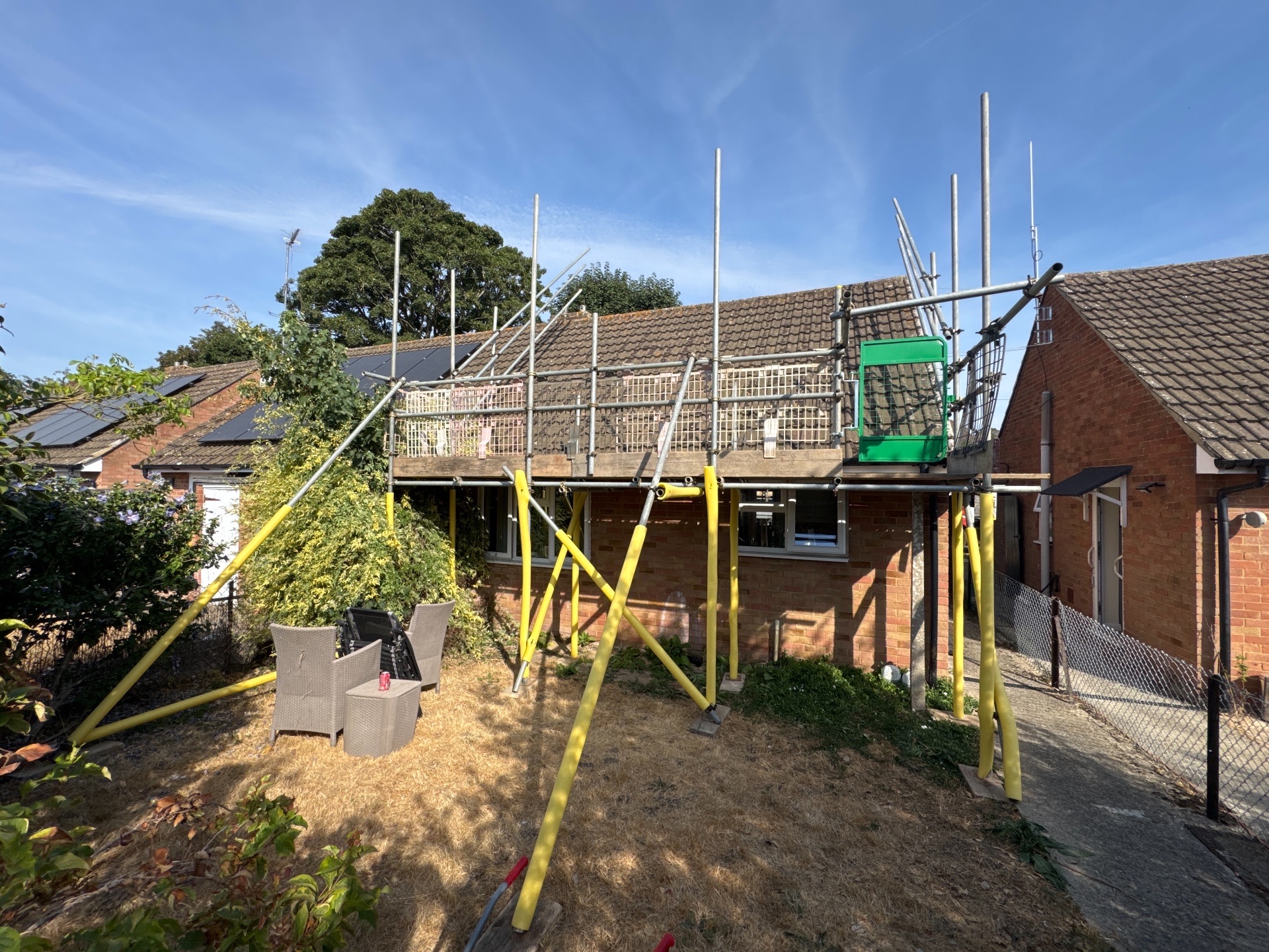 Domestic scaffolding erected by ATC Scaffolding around a house for roofing and exterior works