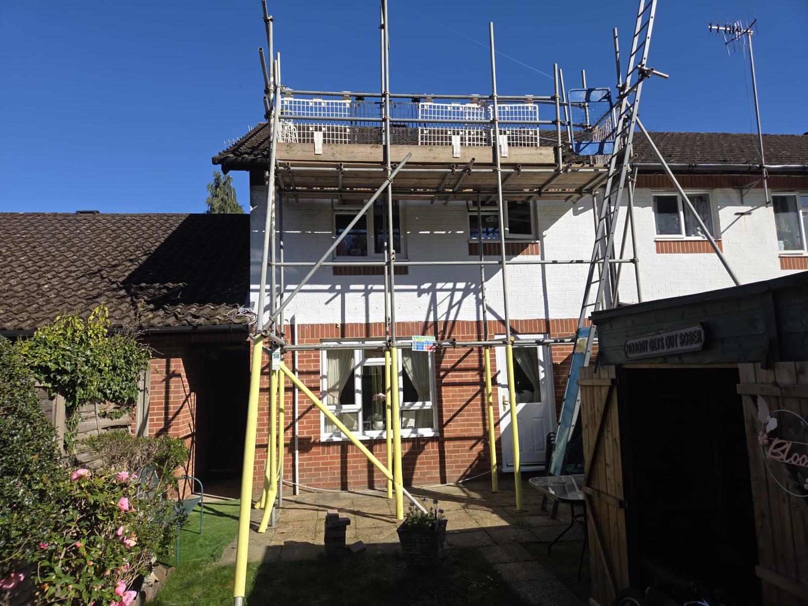 Domestic scaffolding erected by ATC Scaffolding around a house for roofing and exterior works