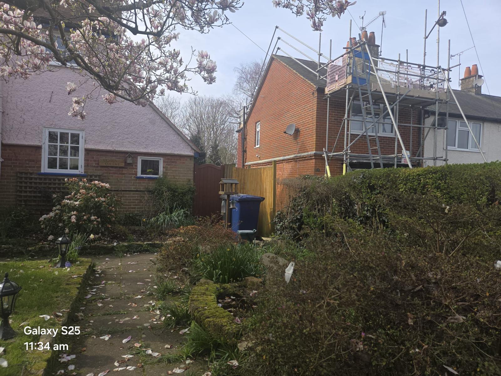 Domestic scaffolding erected by ATC Scaffolding around a house for roofing and exterior works