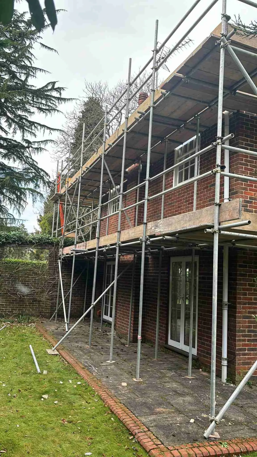 Domestic scaffolding erected by ATC Scaffolding around a house for roofing and exterior works
