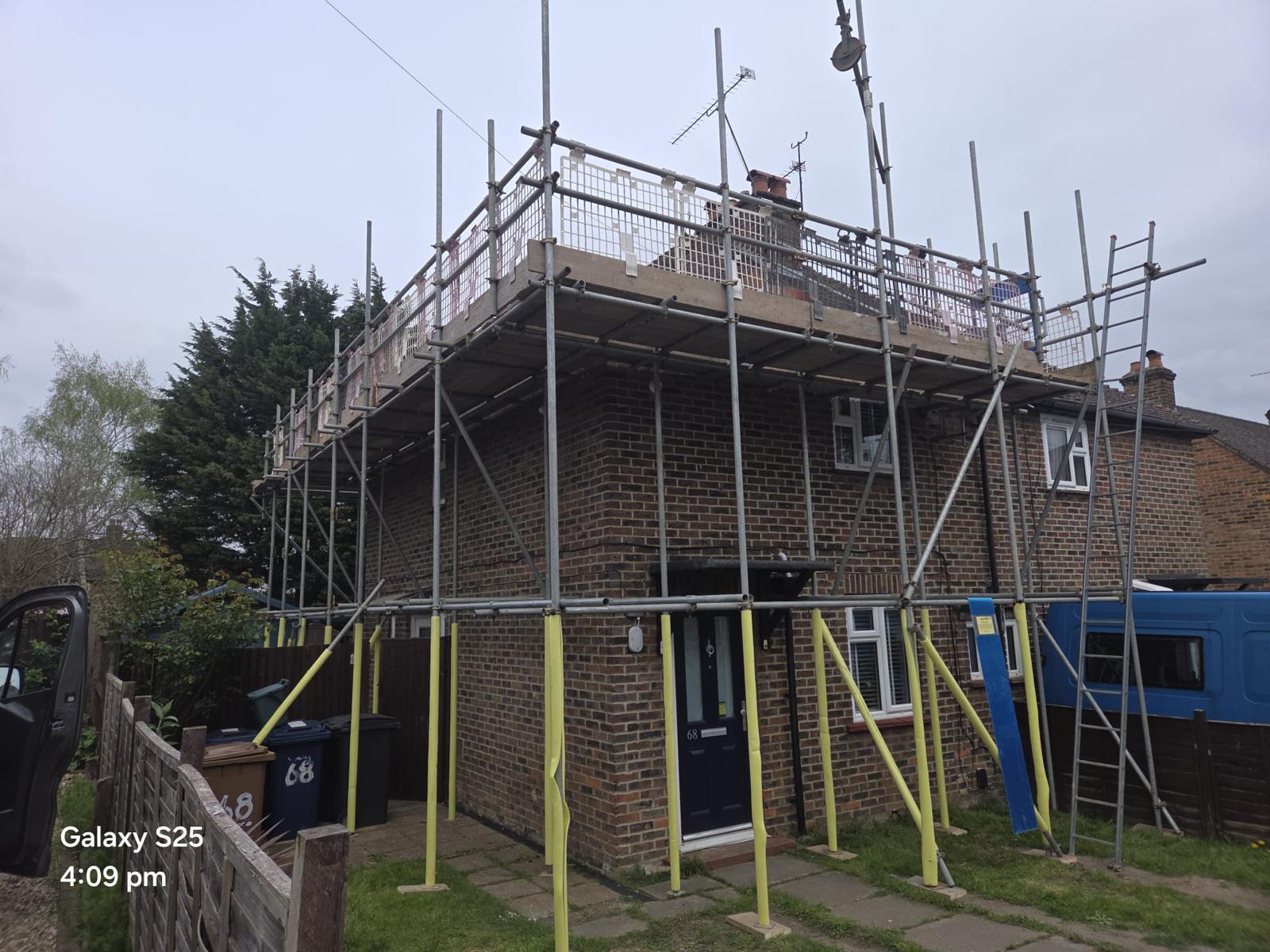 Domestic scaffolding erected by ATC Scaffolding around a house for roofing and exterior works