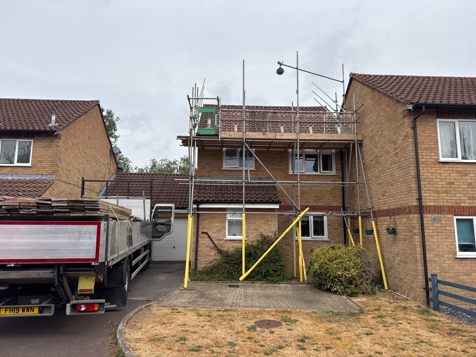 Domestic scaffolding erected by ATC Scaffolding around a house for roofing and exterior works