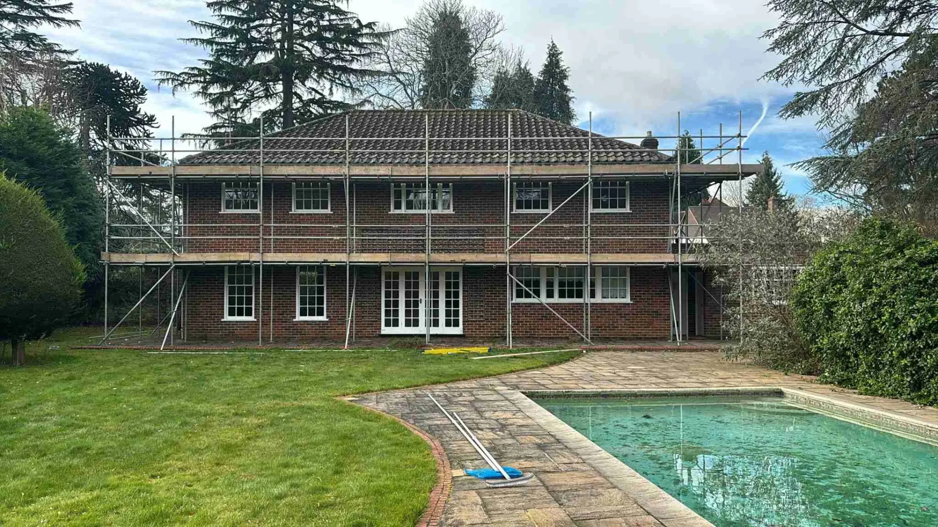 Domestic scaffolding erected by ATC Scaffolding around a house for roofing and exterior works