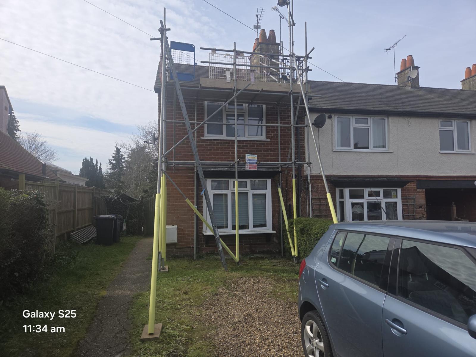 Domestic scaffolding erected by ATC Scaffolding around a house for roofing and exterior works