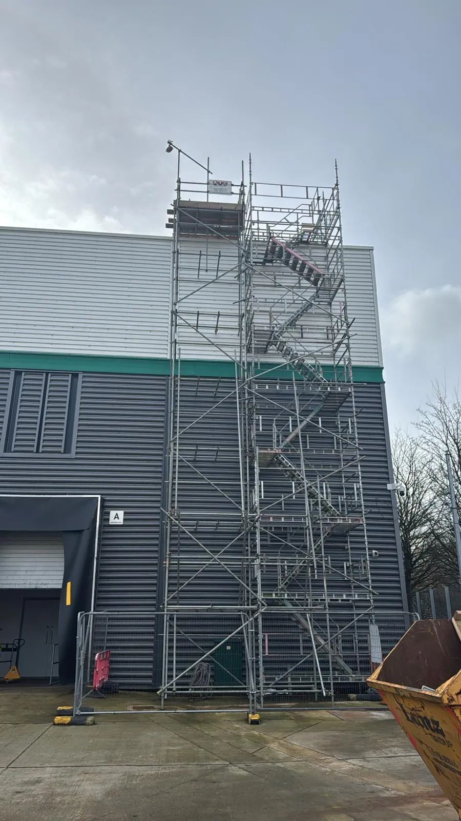 External scaffolding staircase tower providing safe access on a commercial building