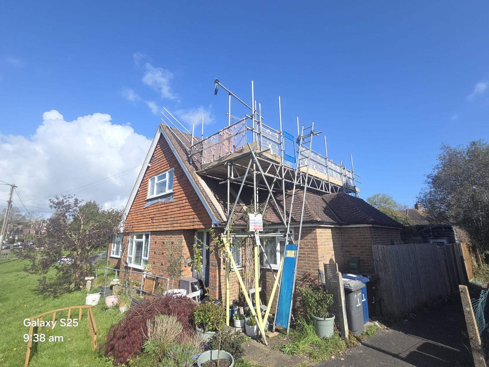 Domestic scaffolding erected by ATC Scaffolding around a house for roofing and exterior works