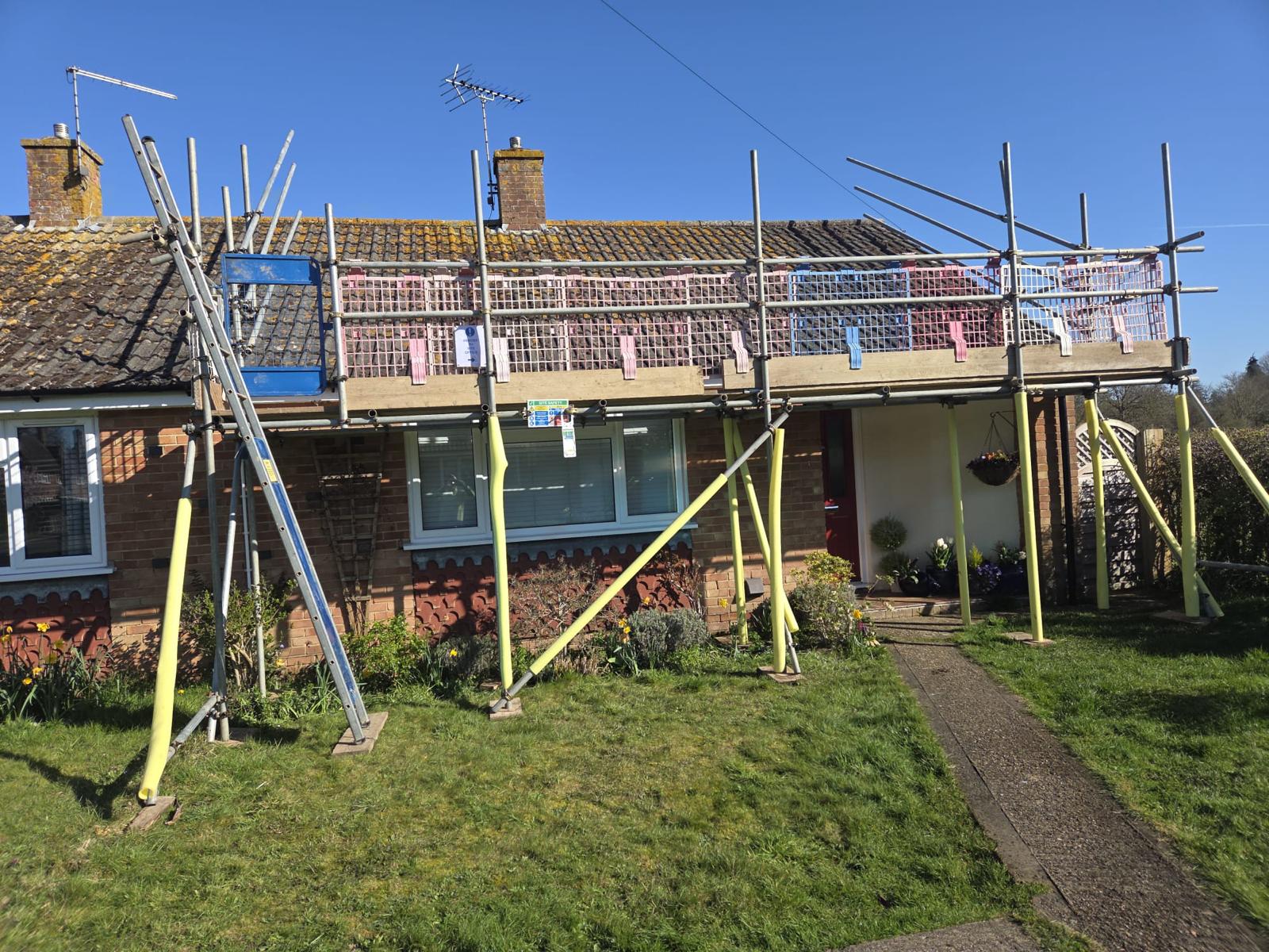 Domestic scaffolding erected by ATC Scaffolding around a house for roofing and exterior works