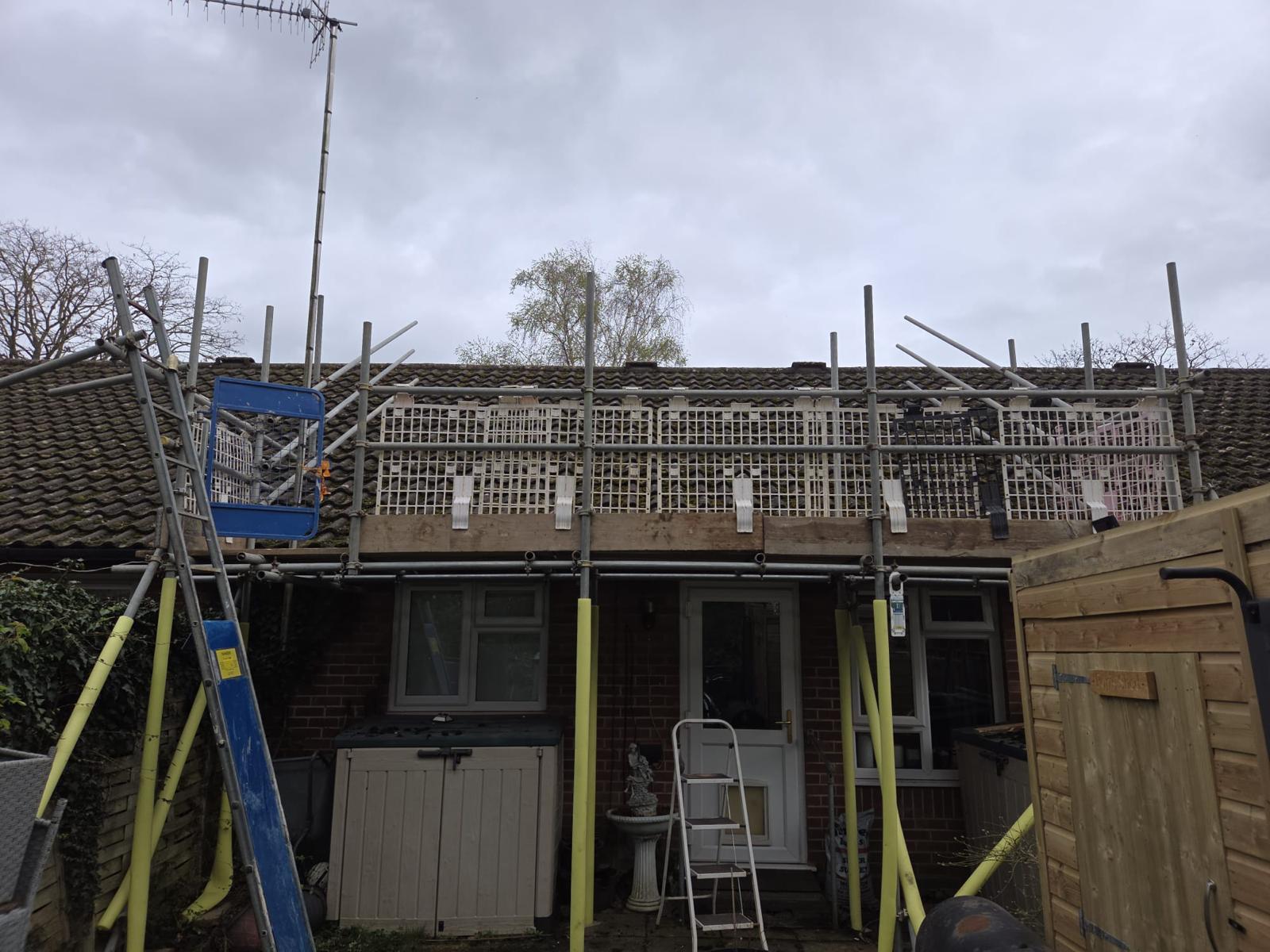 Domestic scaffolding erected by ATC Scaffolding around a house for roofing and exterior works
