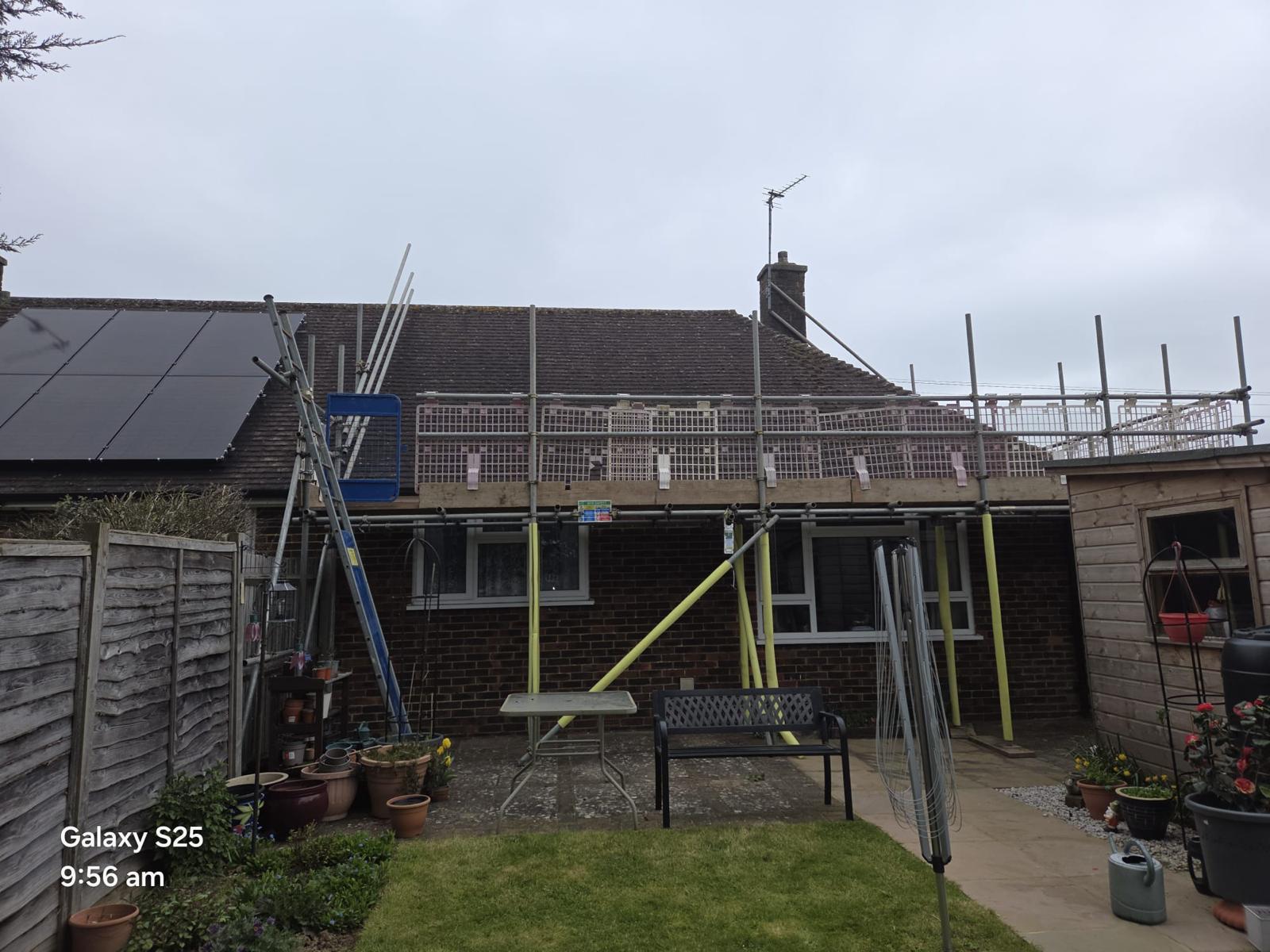 Domestic scaffolding erected by ATC Scaffolding around a house for roofing and exterior works