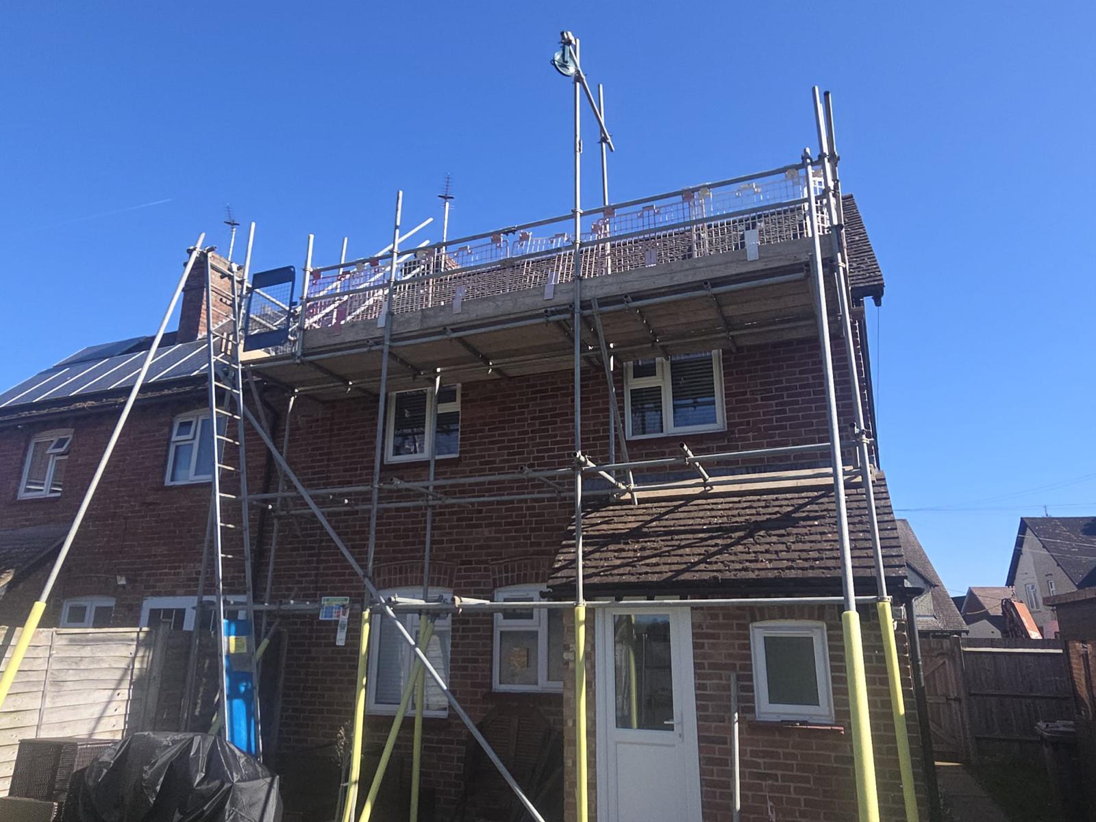Domestic scaffolding erected by ATC Scaffolding around a house for roofing and exterior works