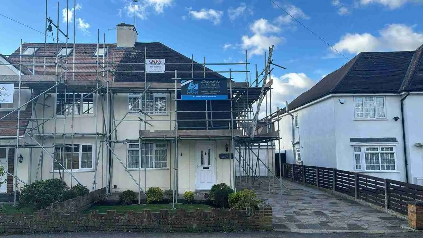 Domestic scaffolding erected by ATC Scaffolding around a house for roofing and exterior works