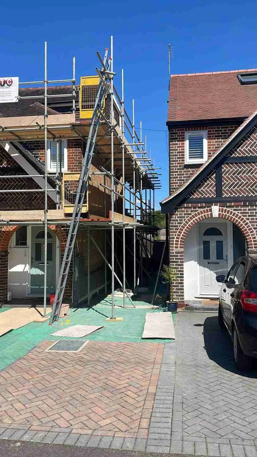 Domestic scaffolding erected by ATC Scaffolding around a house for roofing and exterior works